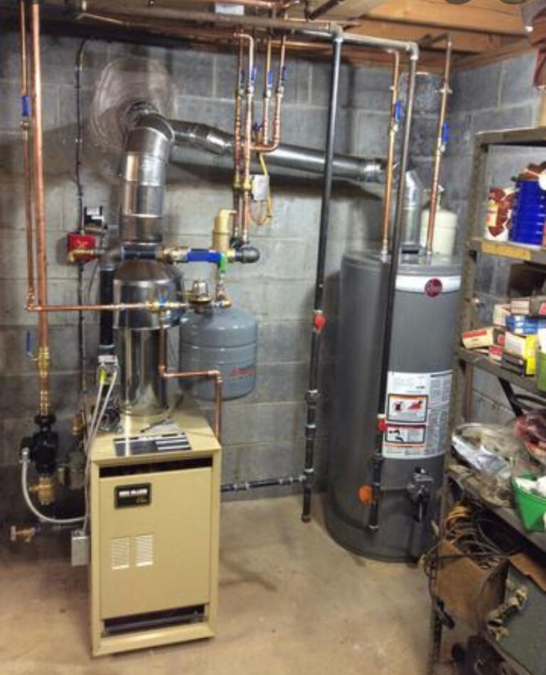Boiler and water heater installation with new piping by Ironside Plumbing & Heating