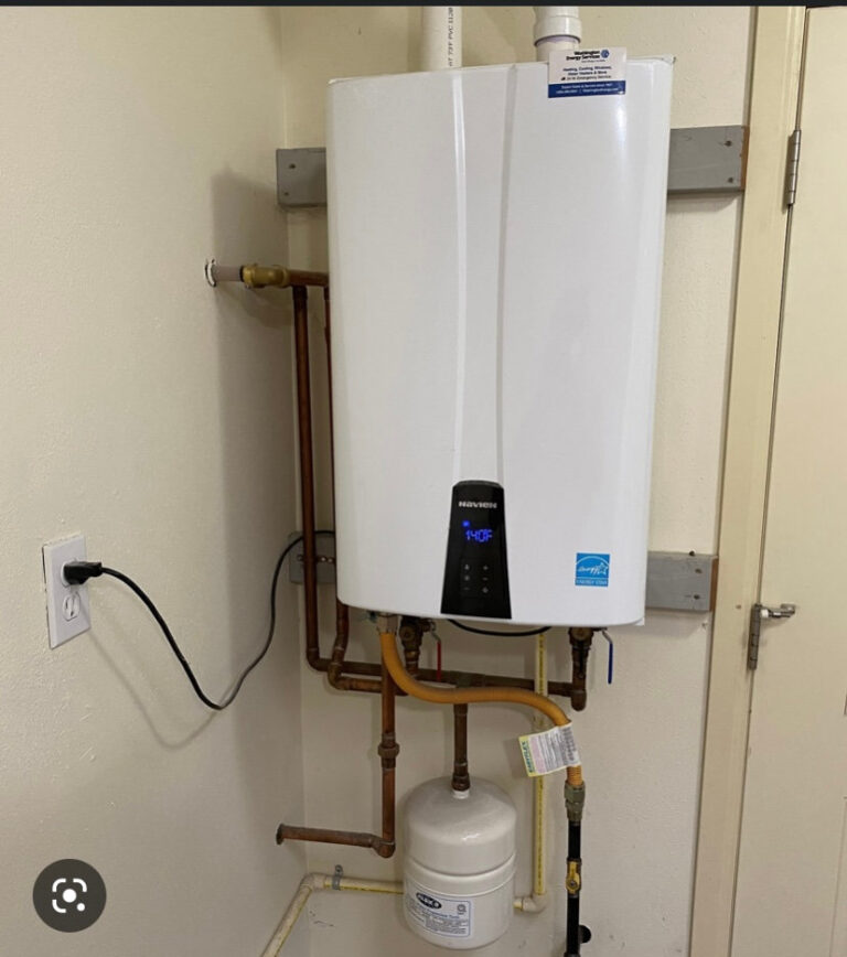 Wall-mounted tankless water heater installed by Ironside Plumbing & Heating